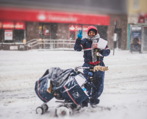 Delivery woman in snow